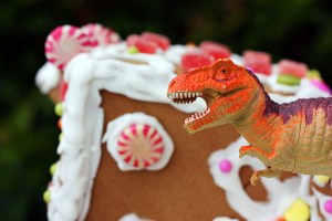 gingerbread house with dinosaur