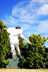 my son, dressed as an angel, in motion